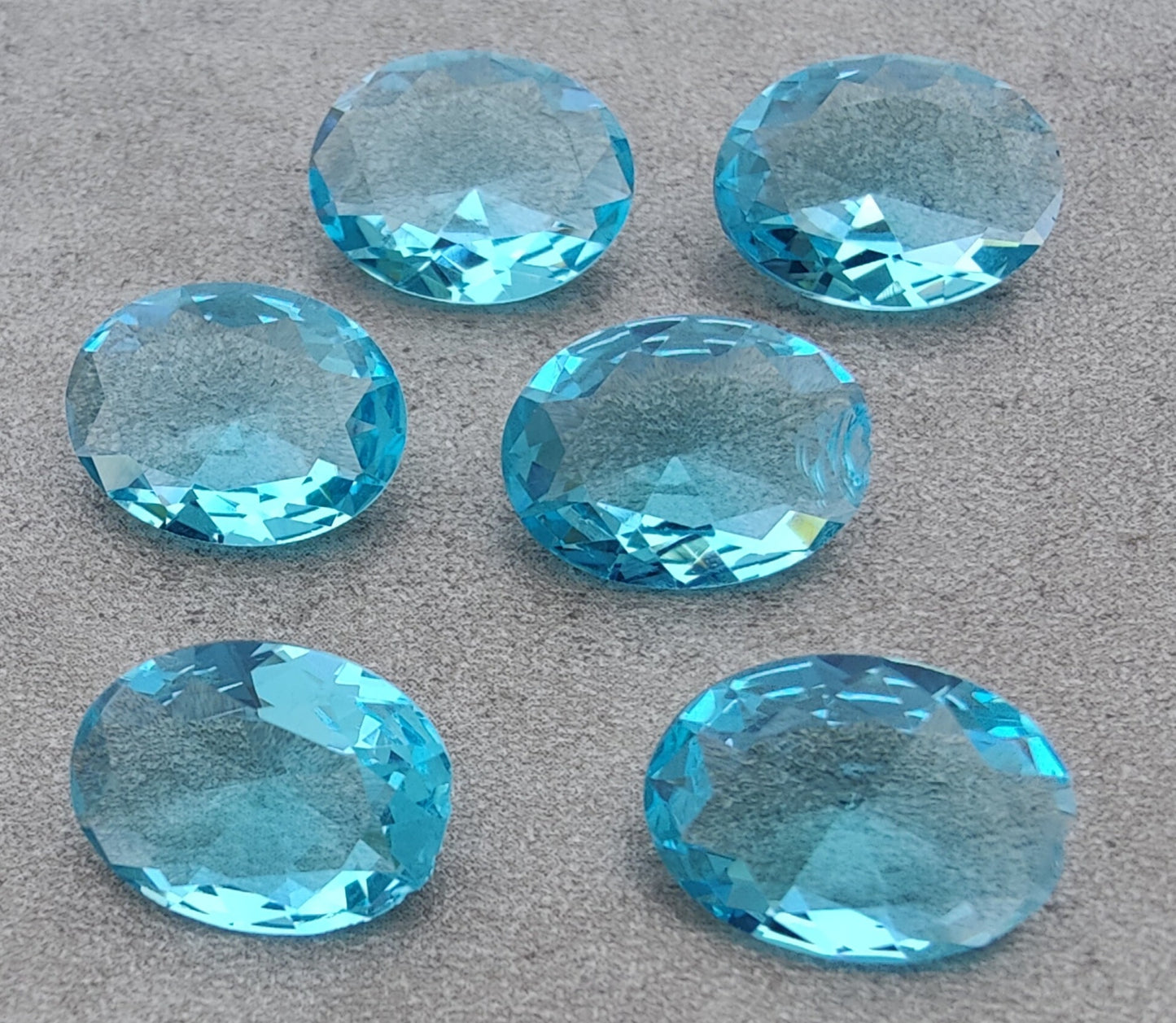 NATURAL BLUE TOPAZ OVAL SHAPE FACETED CUT FLAT BACK CALIBRATED OVAL SHAPEGEMSTONES, ALL SIZES AVAILABLE