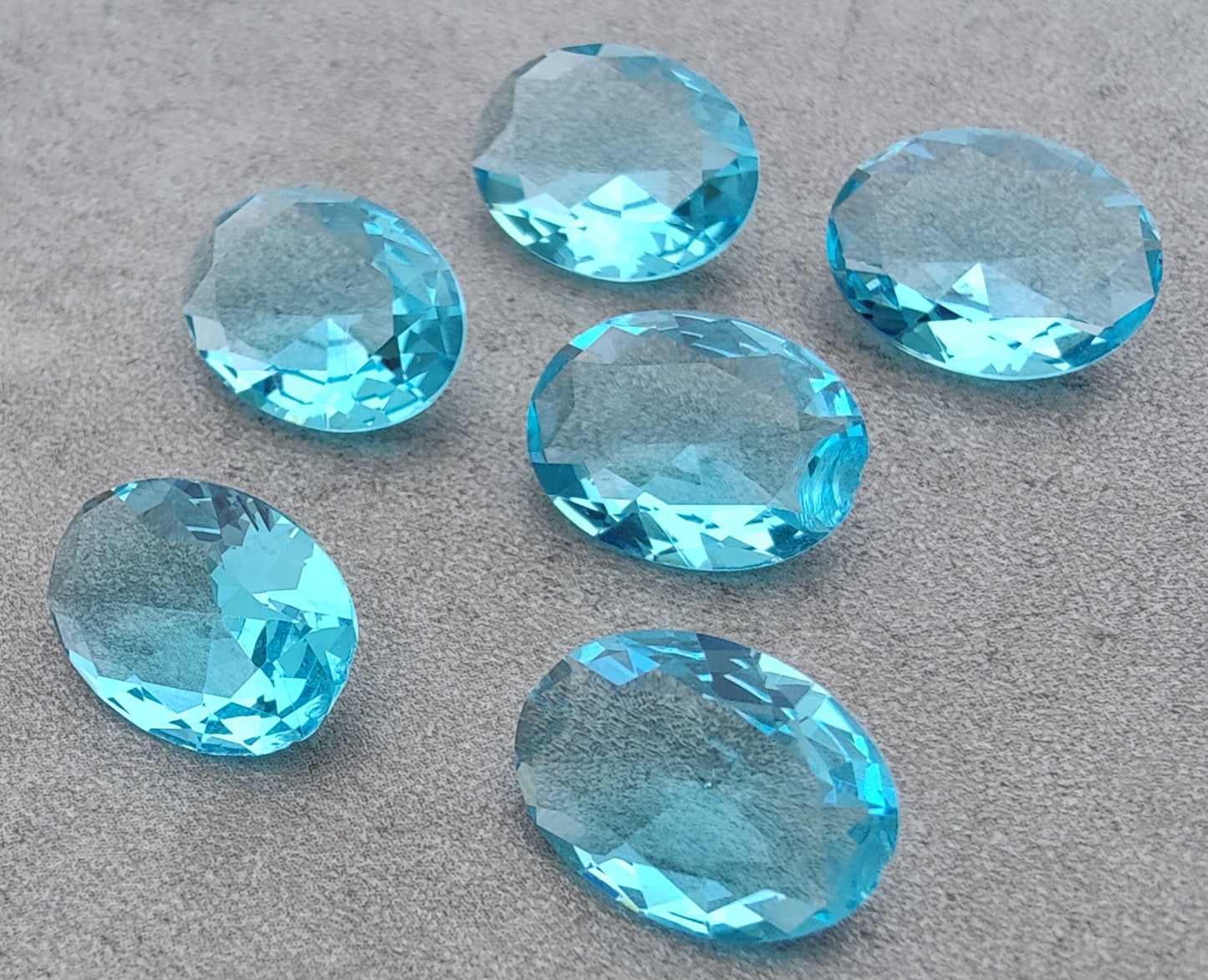 NATURAL BLUE TOPAZ OVAL SHAPE FACETED CUT FLAT BACK CALIBRATED OVAL SHAPEGEMSTONES, ALL SIZES AVAILABLE