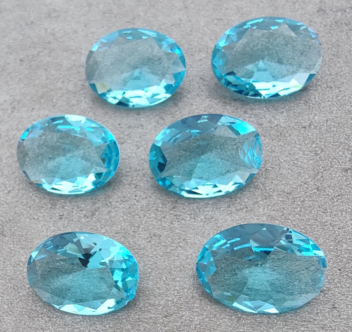 NATURAL BLUE TOPAZ OVAL SHAPE FACETED CUT FLAT BACK CALIBRATED OVAL SHAPEGEMSTONES, ALL SIZES AVAILABLE