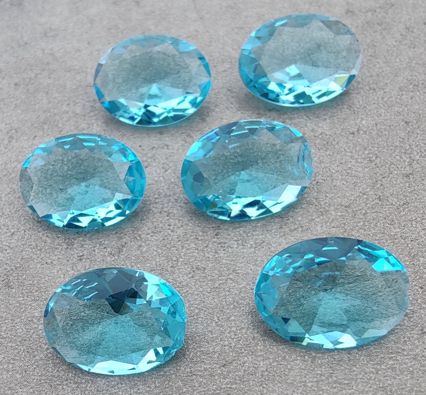 NATURAL BLUE TOPAZ OVAL SHAPE FACETED CUT FLAT BACK CALIBRATED OVAL SHAPEGEMSTONES, ALL SIZES AVAILABLE