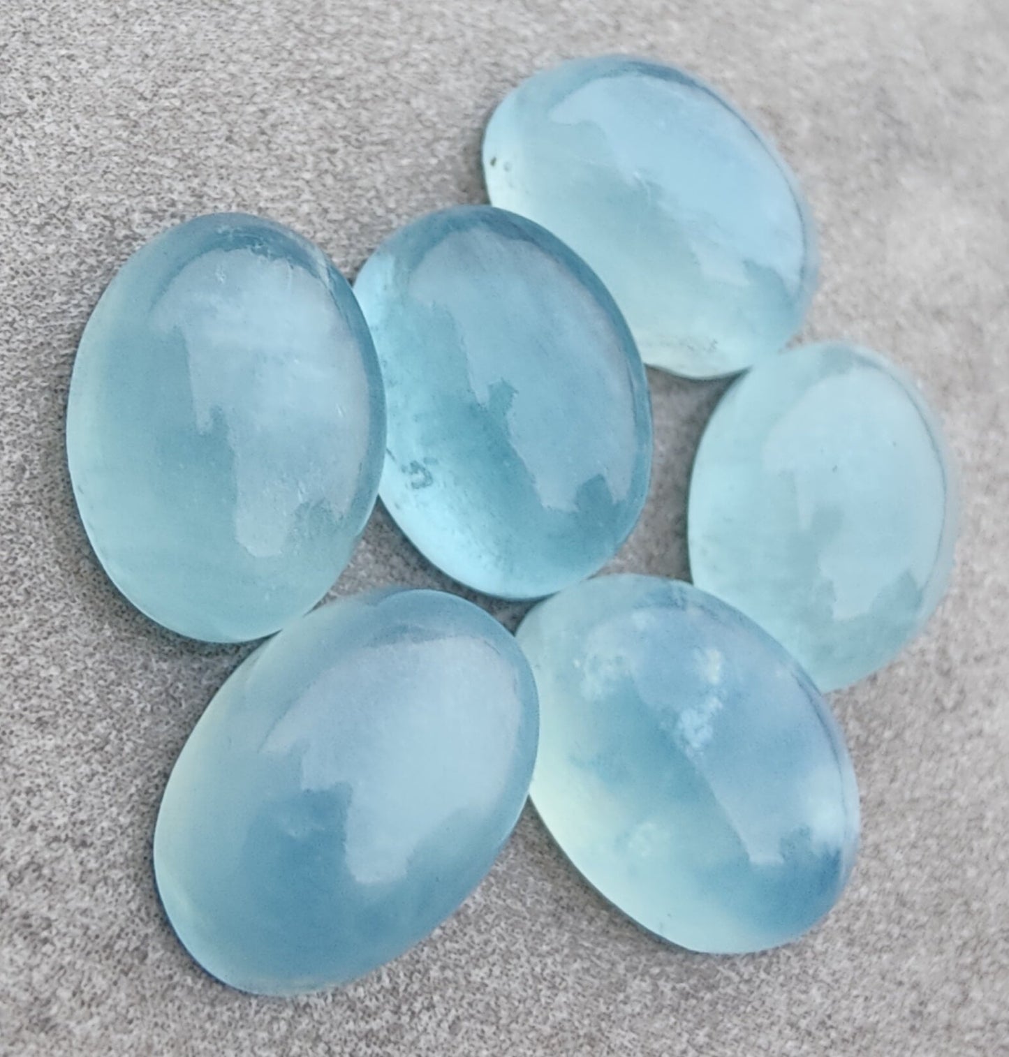 AAA+ QUALITY NATURAL AQUA MILKY OVAL SHAPE CABOCHON FLAT BACK CALIBRATED WHOLESALE GEMSTONES, ALL SIZES AVAILABLE