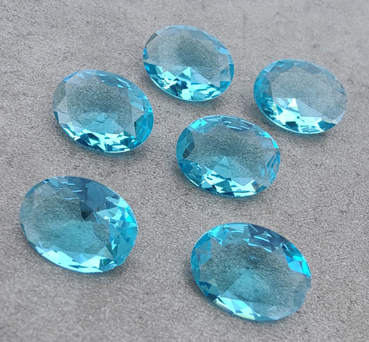 NATURAL BLUE TOPAZ OVAL SHAPE FACETED CUT FLAT BACK CALIBRATED OVAL SHAPEGEMSTONES, ALL SIZES AVAILABLE