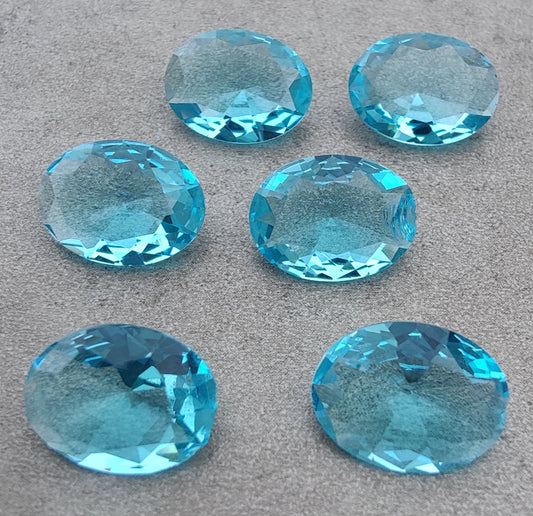 NATURAL BLUE TOPAZ OVAL SHAPE FACETED CUT FLAT BACK CALIBRATED OVAL SHAPEGEMSTONES, ALL SIZES AVAILABLE
