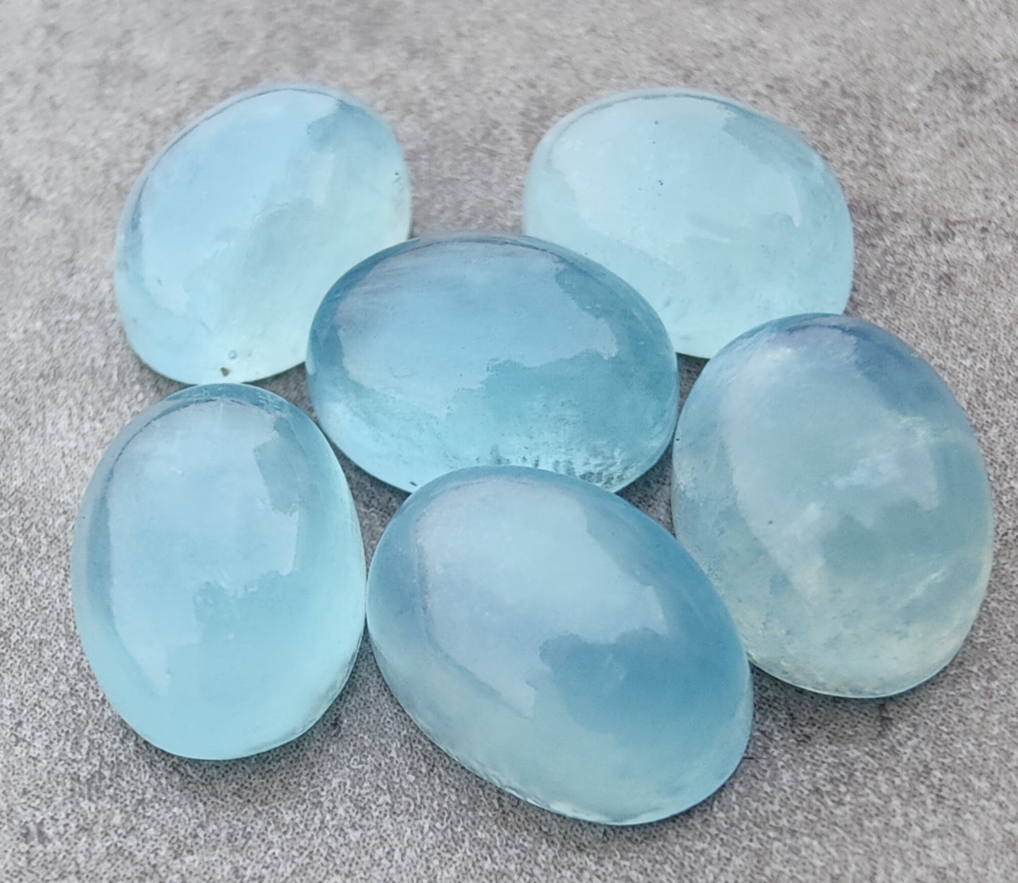 AAA+ QUALITY NATURAL AQUA MILKY OVAL SHAPE CABOCHON FLAT BACK CALIBRATED WHOLESALE GEMSTONES, ALL SIZES AVAILABLE
