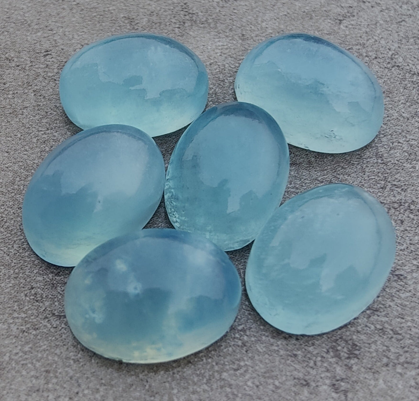 AAA+ QUALITY NATURAL AQUA MILKY OVAL SHAPE CABOCHON FLAT BACK CALIBRATED WHOLESALE GEMSTONES, ALL SIZES AVAILABLE