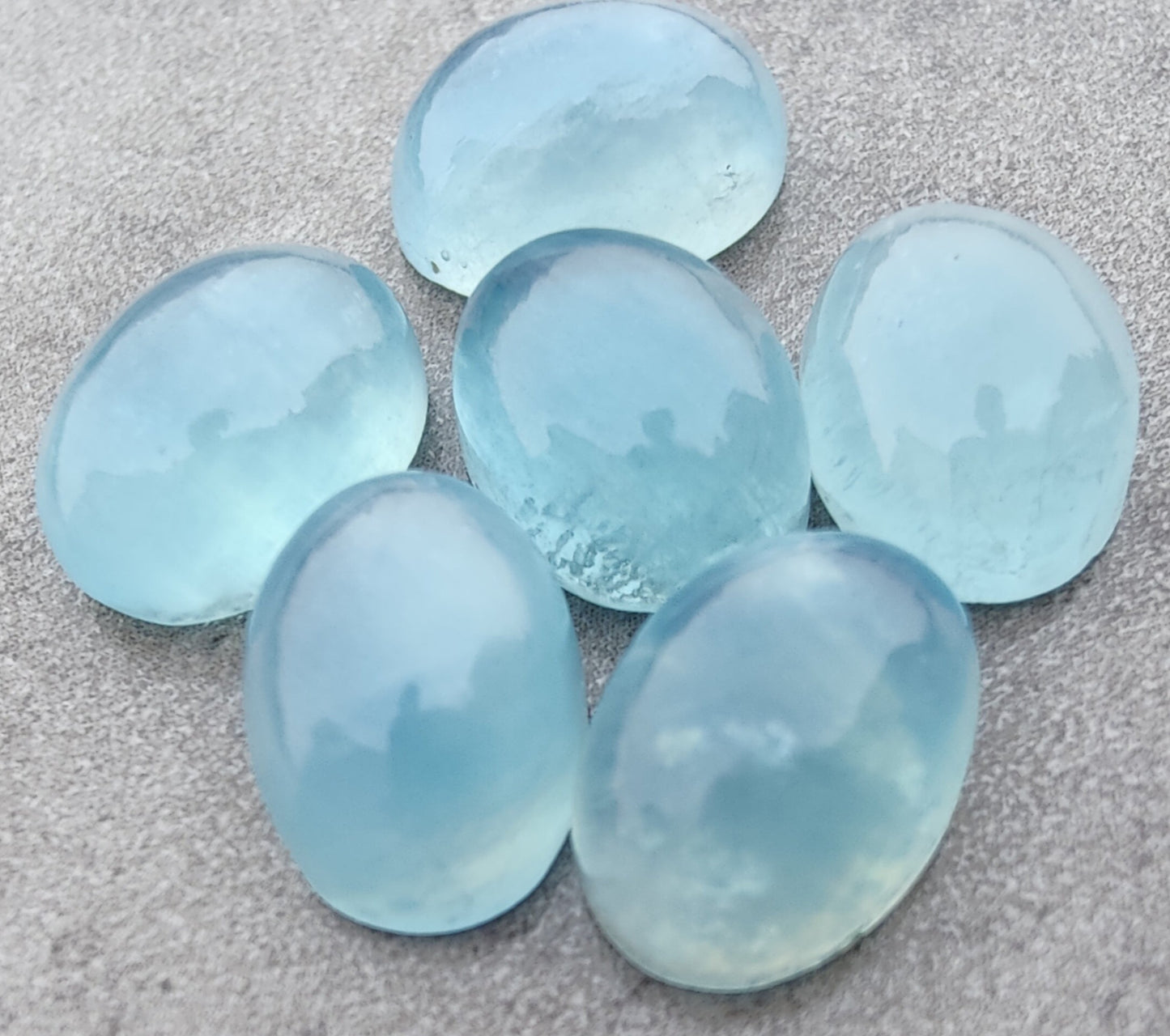 AAA+ QUALITY NATURAL AQUA MILKY OVAL SHAPE CABOCHON FLAT BACK CALIBRATED WHOLESALE GEMSTONES, ALL SIZES AVAILABLE