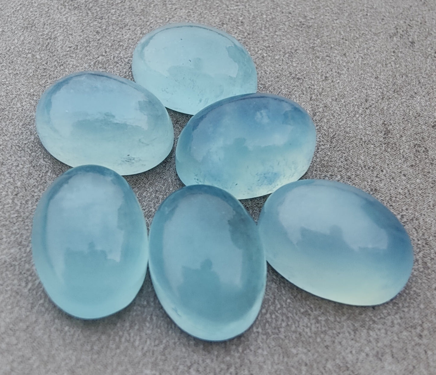 AAA+ QUALITY NATURAL AQUA MILKY OVAL SHAPE CABOCHON FLAT BACK CALIBRATED WHOLESALE GEMSTONES, ALL SIZES AVAILABLE