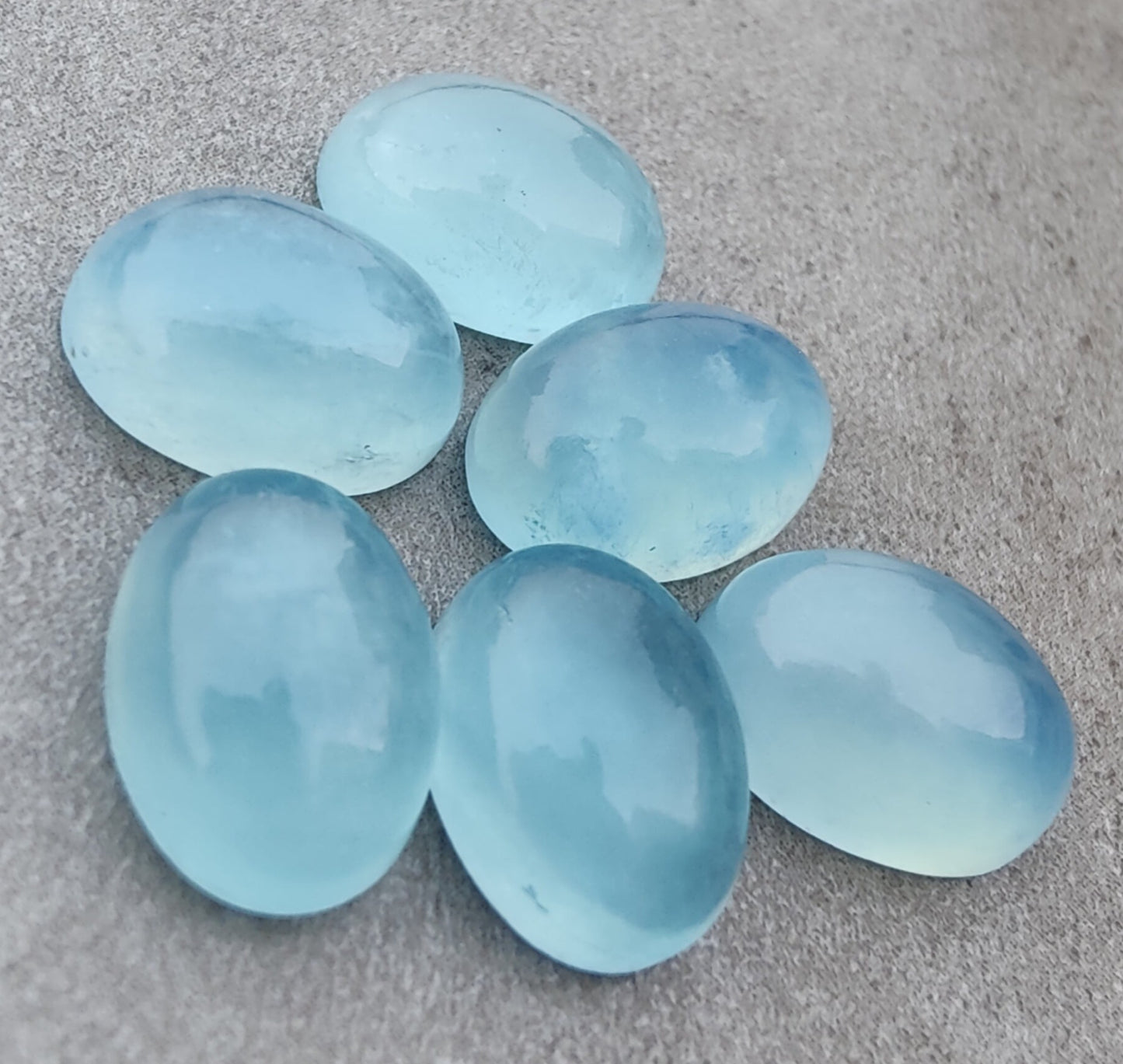 AAA+ QUALITY NATURAL AQUA MILKY OVAL SHAPE CABOCHON FLAT BACK CALIBRATED WHOLESALE GEMSTONES, ALL SIZES AVAILABLE