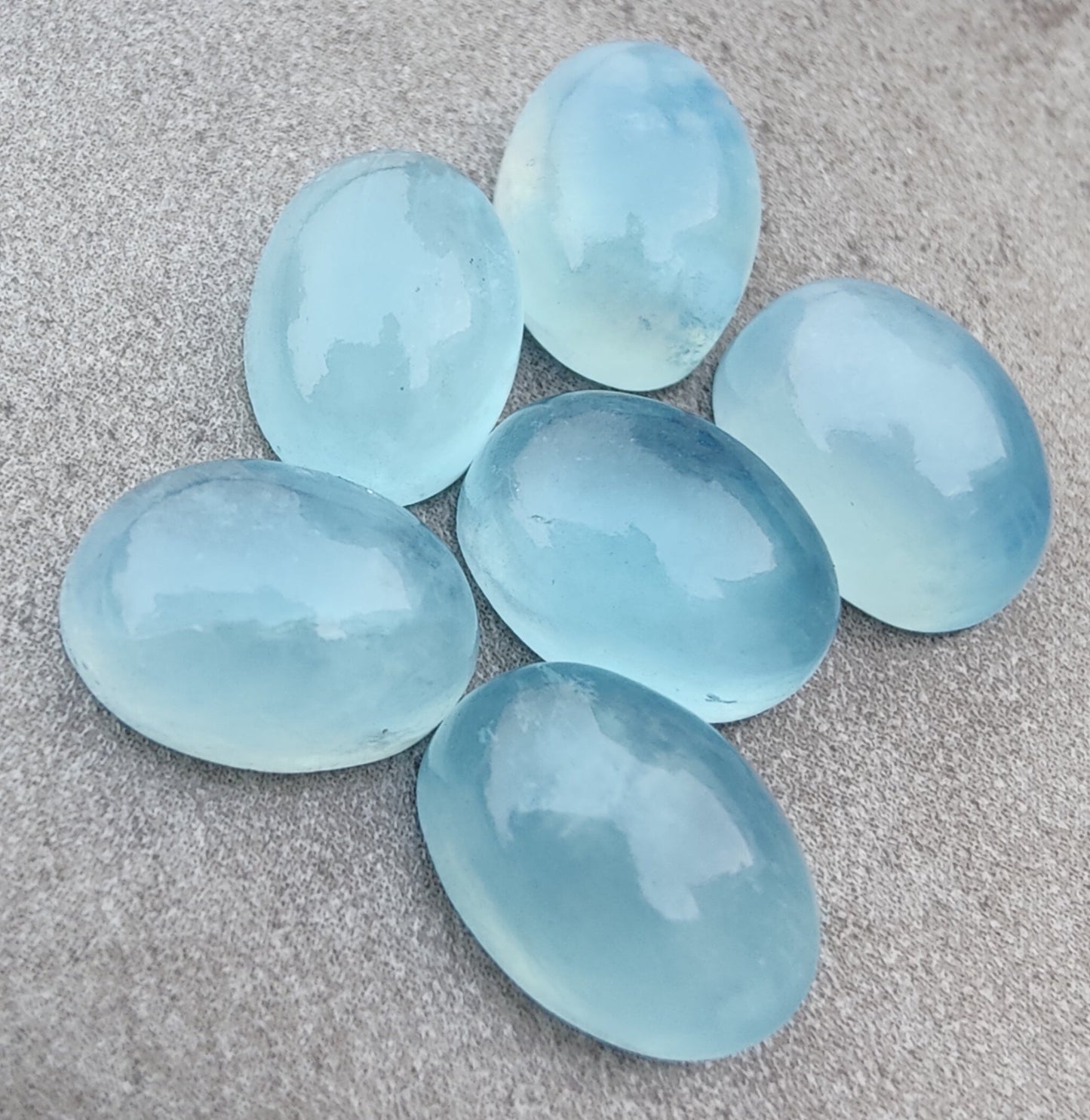 AAA+ QUALITY NATURAL AQUA MILKY OVAL SHAPE CABOCHON FLAT BACK CALIBRATED WHOLESALE GEMSTONES, ALL SIZES AVAILABLE