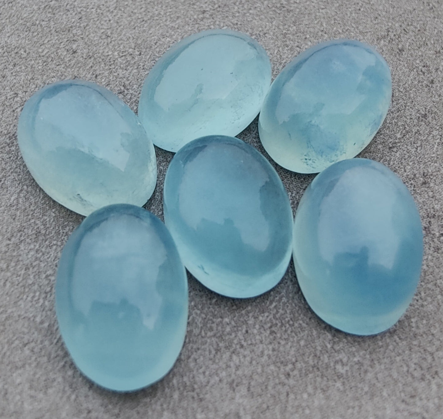 AAA+ QUALITY NATURAL AQUA MILKY OVAL SHAPE CABOCHON FLAT BACK CALIBRATED WHOLESALE GEMSTONES, ALL SIZES AVAILABLE