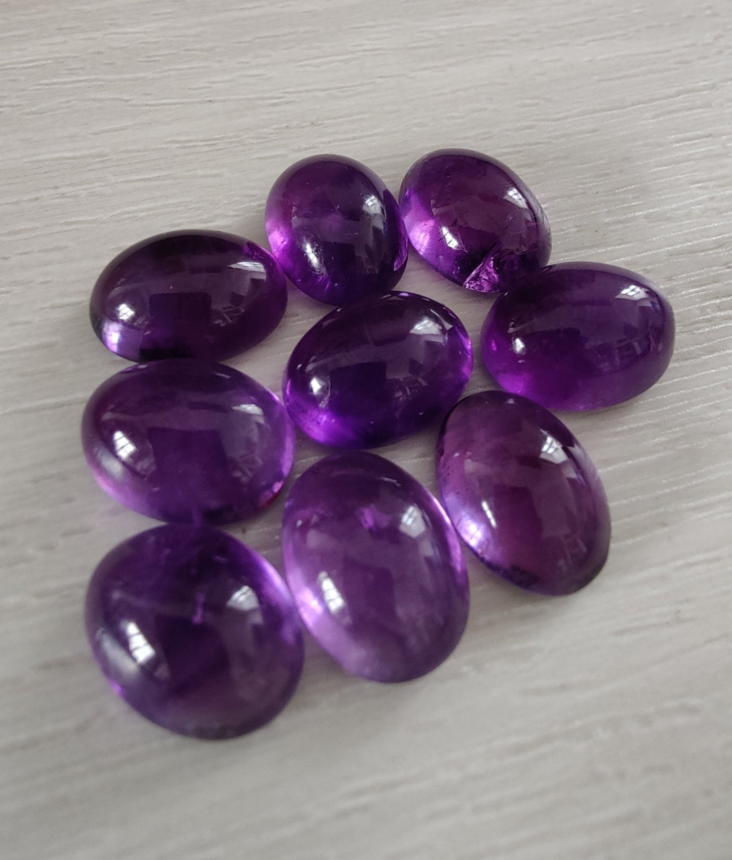 NATURAL AMETHYST OVAL SHAPE FLAT BACK CABOCHON AAA+ QUALITY CALIBRATED GEMSTONES. ALL SIZES AVAILABLE