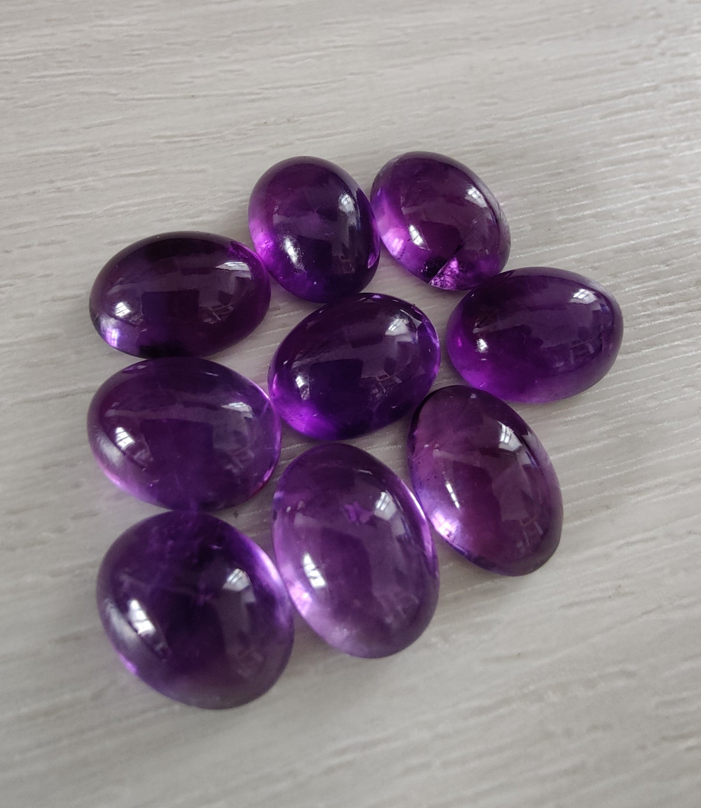 NATURAL AMETHYST OVAL SHAPE FLAT BACK CABOCHON AAA+ QUALITY CALIBRATED GEMSTONES. ALL SIZES AVAILABLE