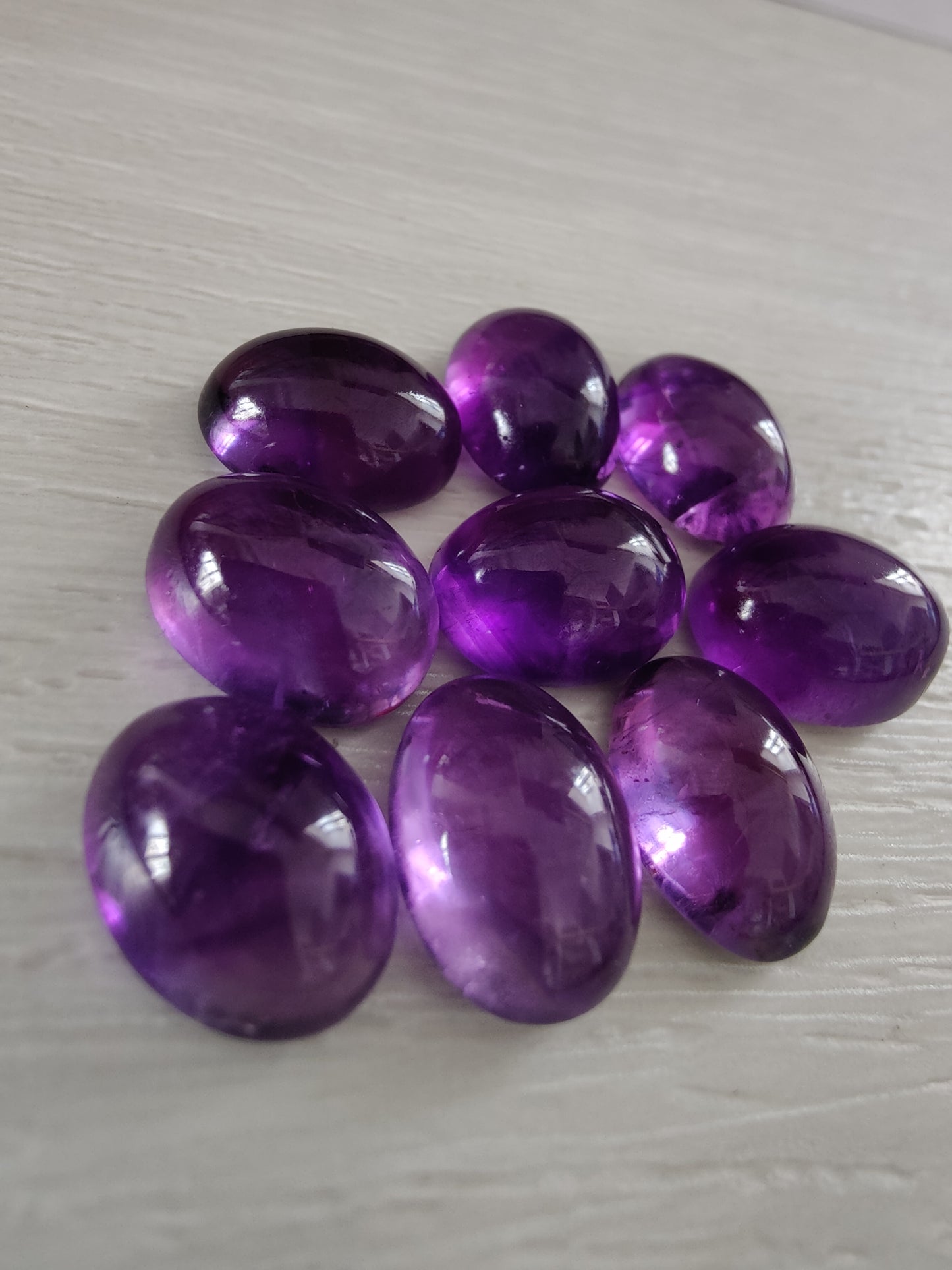 NATURAL AMETHYST OVAL SHAPE FLAT BACK CABOCHON AAA+ QUALITY CALIBRATED GEMSTONES. ALL SIZES AVAILABLE