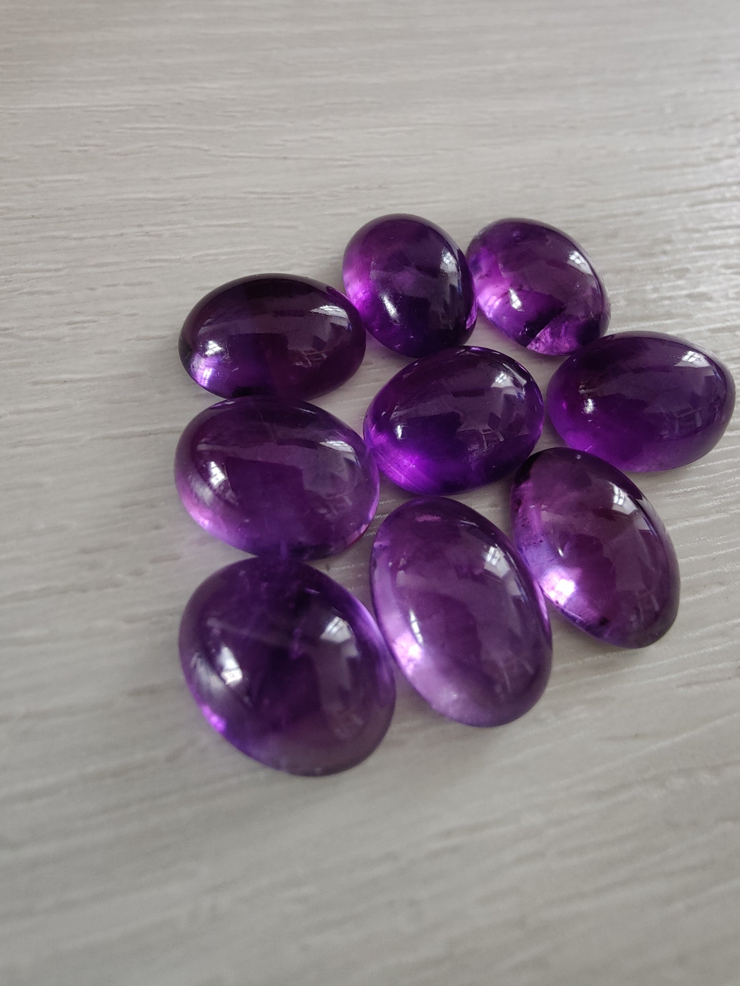 NATURAL AMETHYST OVAL SHAPE FLAT BACK CABOCHON AAA+ QUALITY CALIBRATED GEMSTONES. ALL SIZES AVAILABLE