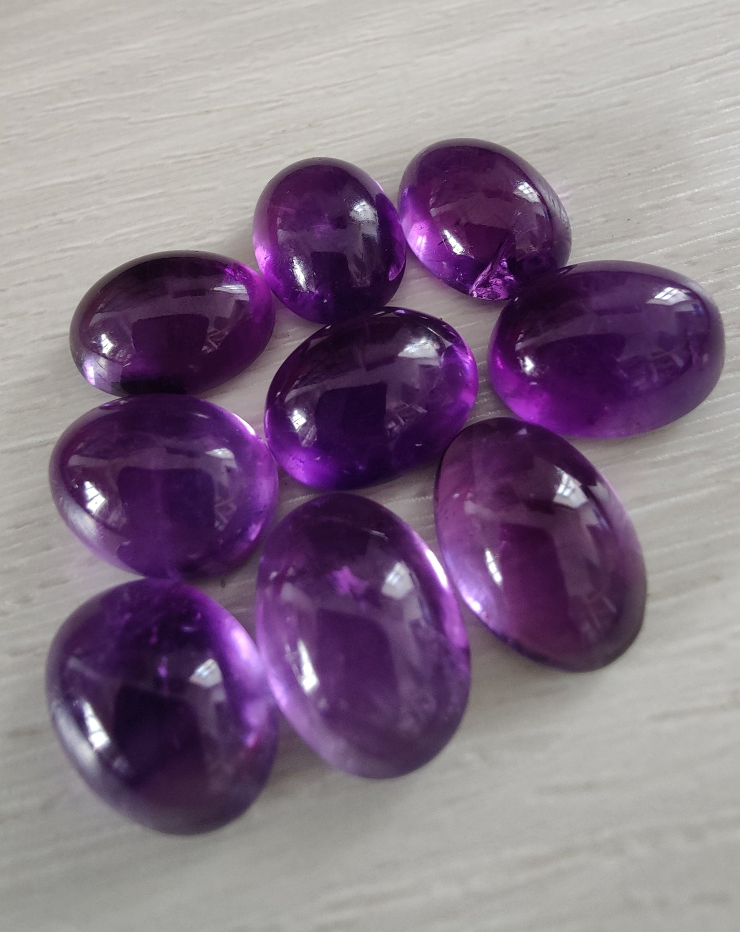NATURAL AMETHYST OVAL SHAPE FLAT BACK CABOCHON AAA+ QUALITY CALIBRATED GEMSTONES. ALL SIZES AVAILABLE