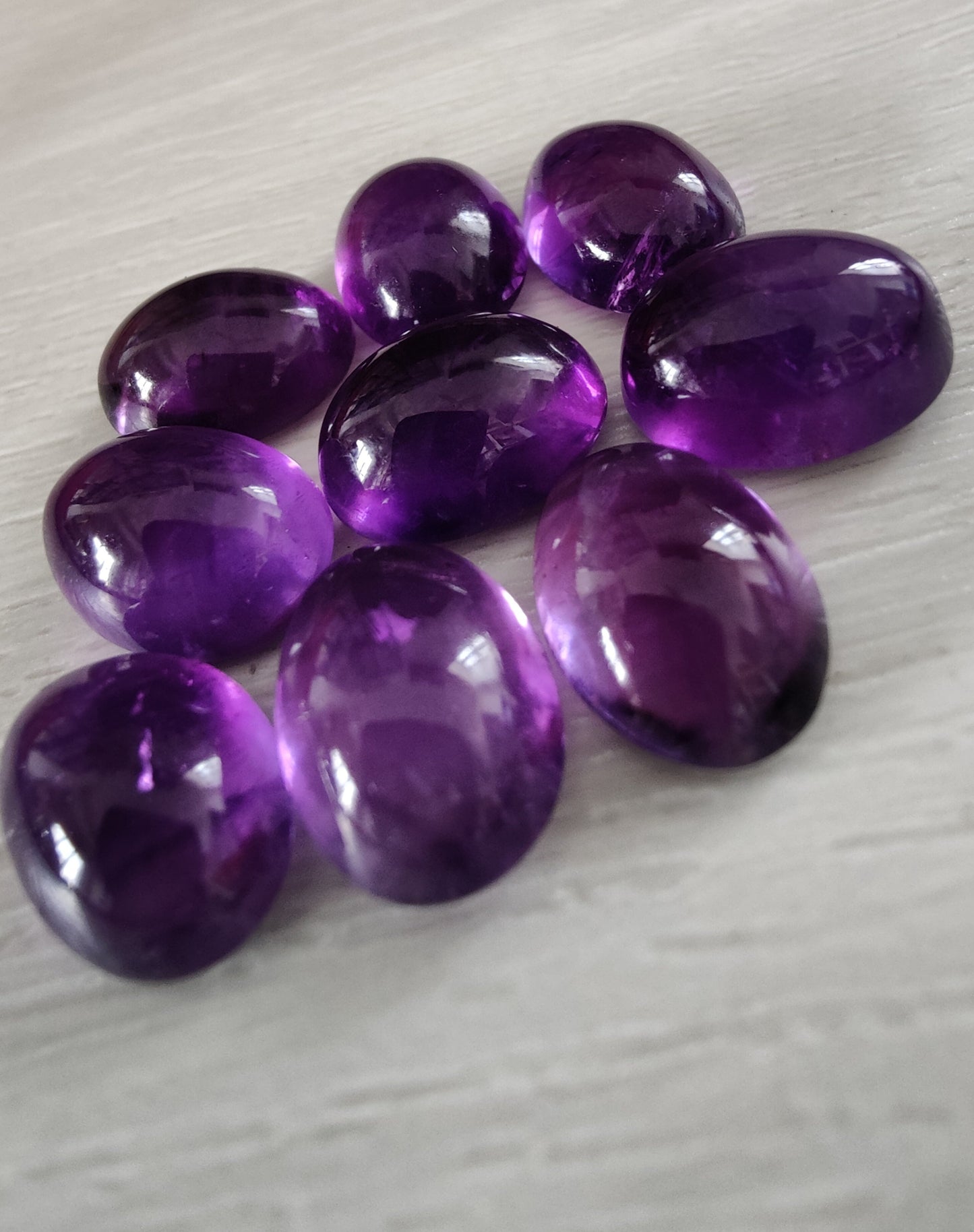 NATURAL AMETHYST OVAL SHAPE FLAT BACK CABOCHON AAA+ QUALITY CALIBRATED GEMSTONES. ALL SIZES AVAILABLE