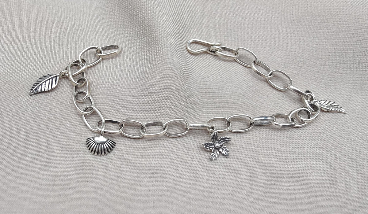 Sterling Silver Charm Bracelet: Leaf, Shell & Flower Charms - Handmade