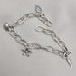 Sterling Silver Charm Bracelet: Leaf, Shell & Flower Charms - Handmade