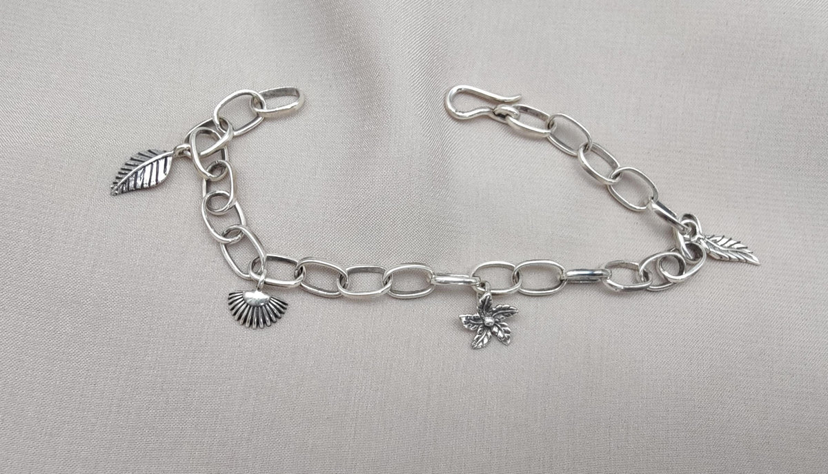 Sterling Silver Charm Bracelet: Leaf, Shell & Flower Charms - Handmade