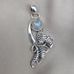 Rainbow Moonstone Silver Pendant: Artisan Floral Leaf Design, Boho Charm